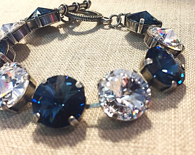 Bold Statement Jewelry! Intense brilliance genuine Swarovski crystal tennis bracelet in Montana blue and clear crystal rivoli stones.