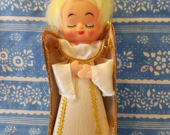 Kitschy angel Christmas tree topper