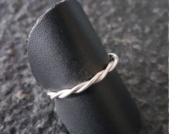 Silver ring twisted