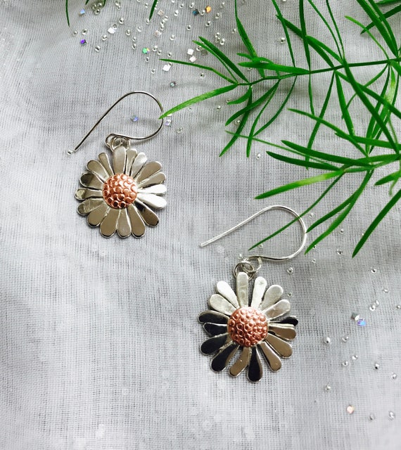 Items similar to Mixed metal Daisy Earrings on Etsy