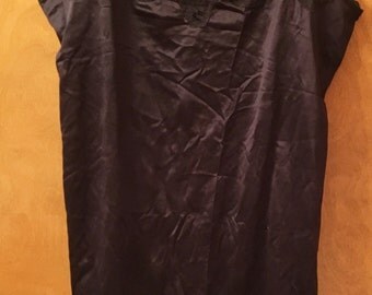 Short black full slip.