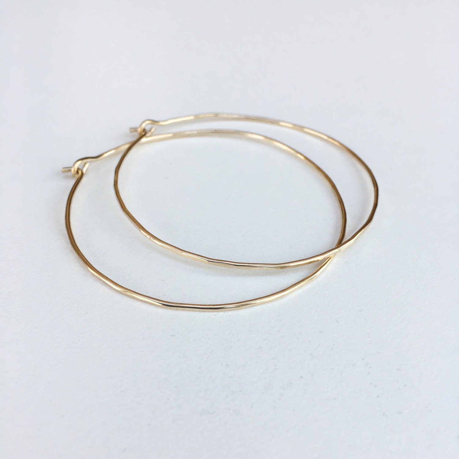 2 inch solid gold hoops 10K solid gold skinny hammered