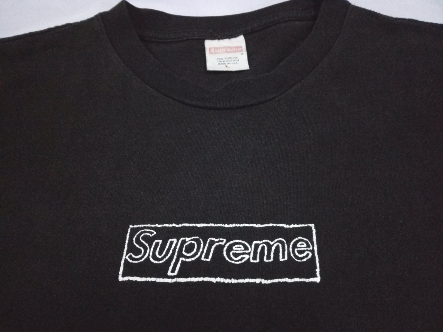 faded supreme shirt