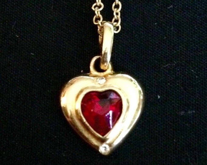 Storewide 25% Off SALE Vintage Deep Ruby Red Heart Pendant With Gold Tone Trim & Chain Featuring Elegant Cut Rhinestone Centerpiece