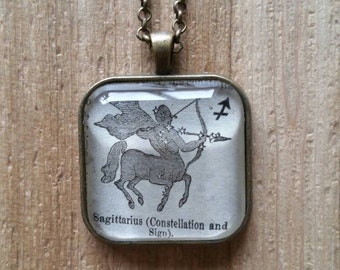 Vintage 1885 Webster's Dictionary Illustration Necklace: Sagittarius.