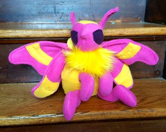 plush rosy maple moth