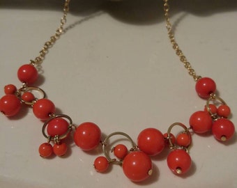 Avon gold tone and faux coral beaded necklace est.1970s