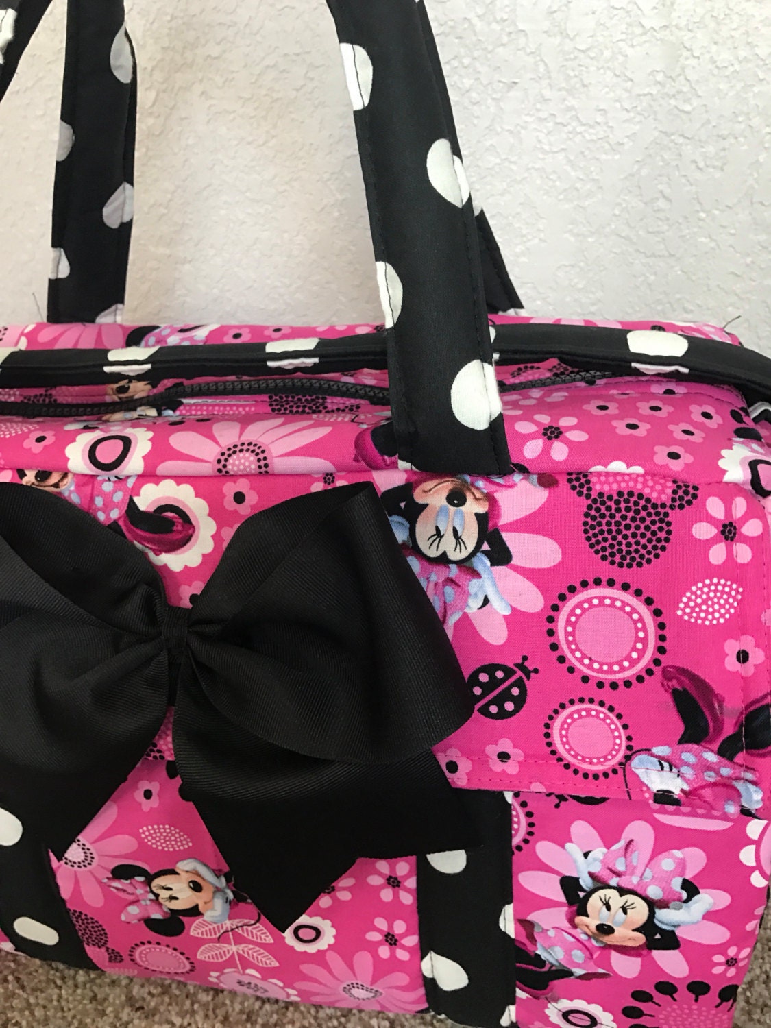 Hot pink Minnie mouse diaper bag with black bow