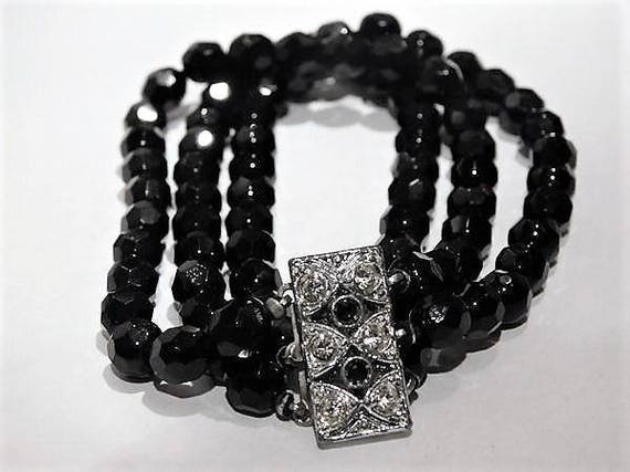 French Jet Black Glass Faceted Bead Bracelet 1950s 50s Mid Century Triple Strand Bracelet Fancy Rhinestone Clasp Hidden Box Mourning Jewelry
