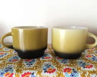 sale--set of 2 Fire King two tone olive green & black mugs