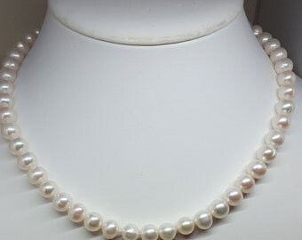 8mm freshwater pearl necklace, 18 inches long single strand, 14k gold ring and post clasp, individually knotted