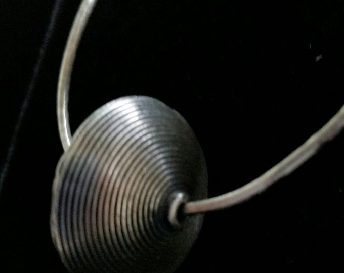 Harmmered and Textured Sterling Silver Hoop with Sterling Bali Bead