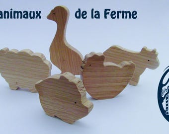 family of 5 farm animals in wood (goose, pig, chicken, cow and sheep)