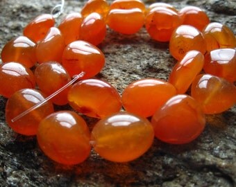 Carnelian beads - smooth polished nuggets oval 7 inches 13mm X 12mm center drilled stones