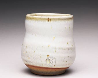 handmade pottery cup, ceramic tumbler, teacup with satin white and light orange shino glazes