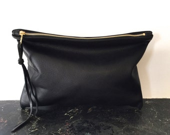 oversized black leather clutch bag