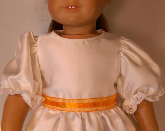 White satin dress with orange flowers and trim. - fits 18" dolls