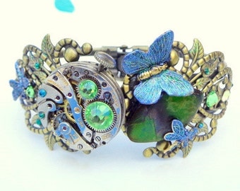 SALE,Steampunk Bracelet,Ruby Jeweled, Vintage Watch Movement,Green,Blue,Golden Ammolite,Peridot,Emerald Crystals,Butterlfly,Dragonfly,OOAK