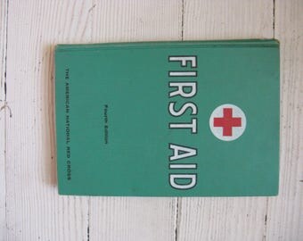 american red cross first aid book hardcover mid century illustrated