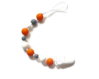 Attache-Suce de dentition