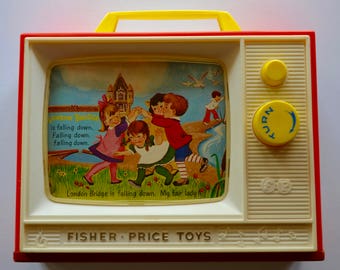 vintage Fisher Price toy: two tunes TV picture stories music box