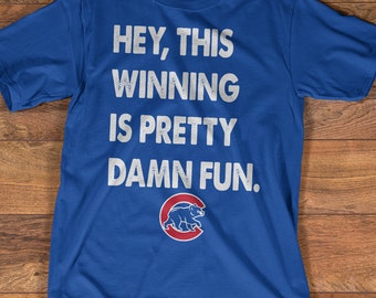 Fly The W Tee. #FlyTheW Chicago Cubs 2016 World Series Champions. This Winning is Pretty Fun. Cubbies Win W Blue Tee. W Cubs Shirt Up to 3XL