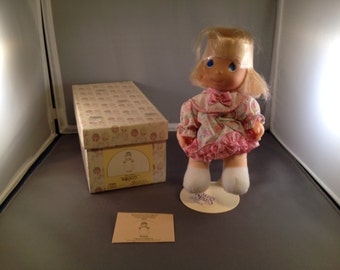 Trish, a 7 inch doll with stand