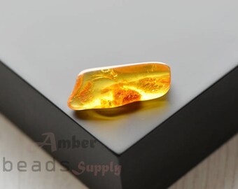 Natural amber stone. Baltic amber piece. Amber stone. 2520/7