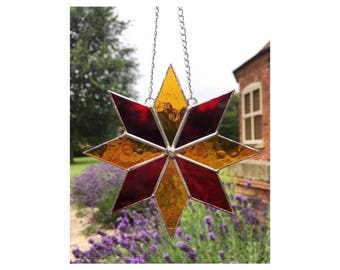 Stained glass red and orange star suncatcher decoration