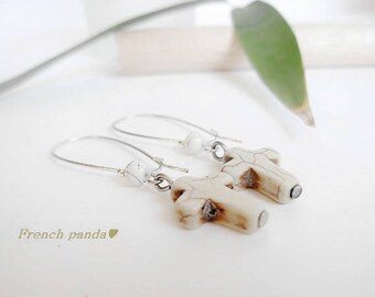 Beautiful pair of Howlite cross earrings