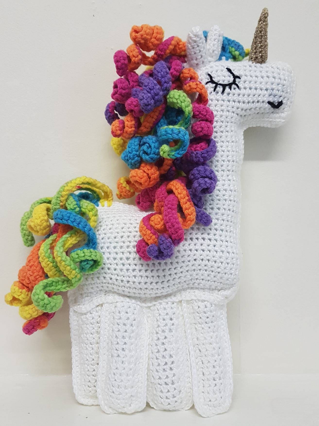 Unicorn rag doll crochet with curly rainbow mane