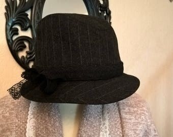 Hats in wool with black and gray stripes