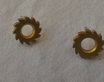 Earring studs in watch mechanism parts recycled