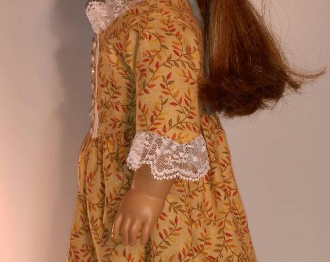Pretty tan colonial dress with fall leaf print for 18 inch dolls fits dolls like American girl