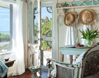 Radiant suncatcher ambiant lighting seashell mirror gilt shell encrusted scallop periwinkle frame ornamental seaside cottage bungalow decor