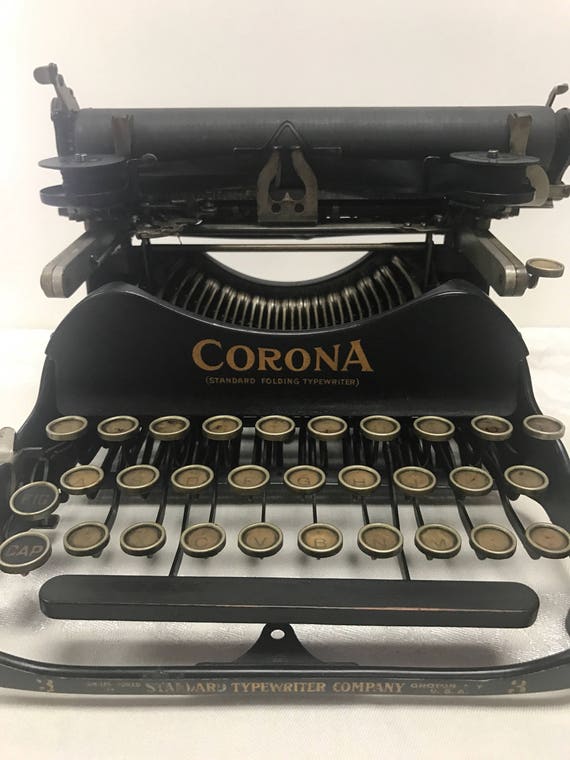 Folding portable typewriter by Corona 1912 works