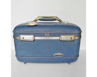 Vintage light blue colored American Tourister "Tiara" train case from the 50-60s