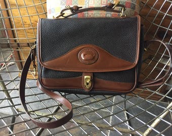 Dooney and Bourke Black and Brown all weather leather bag