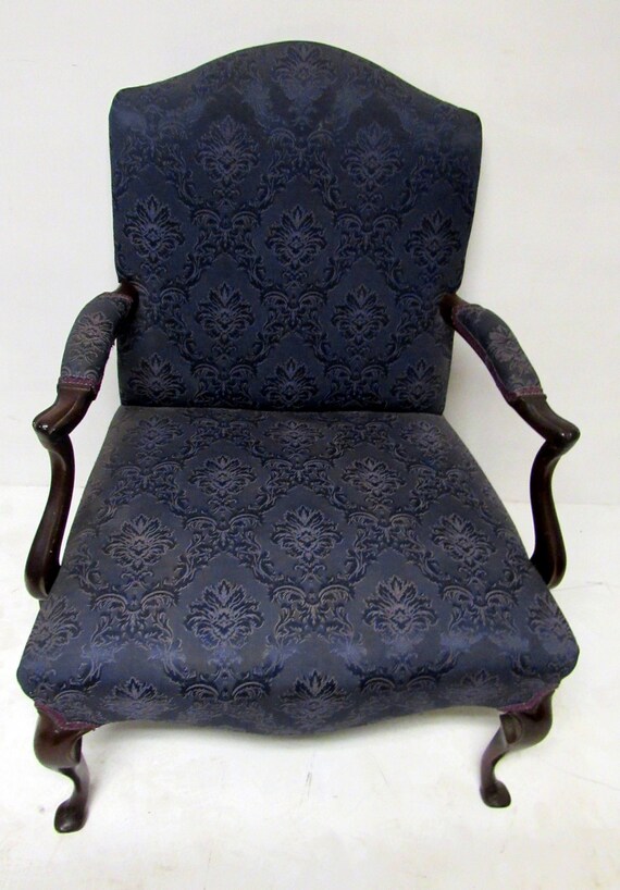 Blue upholstered armchair