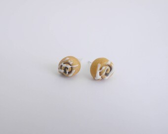 Cinnamon roll greedy earrings
