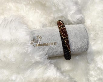 Impressive geometric beaded/crocheted bracelet