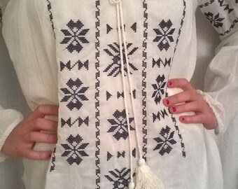 White embroidered cotton long sleeve blouse