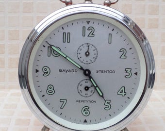 old alarm clock mechanical brand Bayard stentor orange from the 1960s