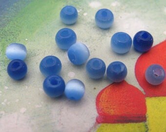 20 beads between 3 and 4 mm blue cat eye