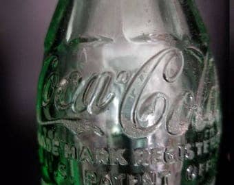 Vintage green glass Coke bottle