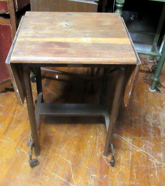 Type writer stand by Hi-Lo