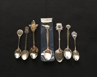 Lot of 7 Souvenir Spoons New York Worlds Fair 1964