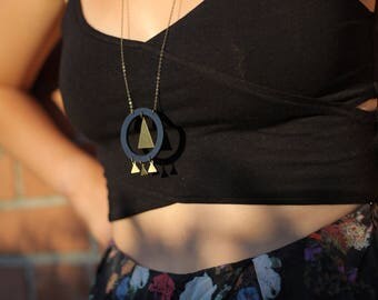 Necklace "Bao" circle black and gold metal triangles