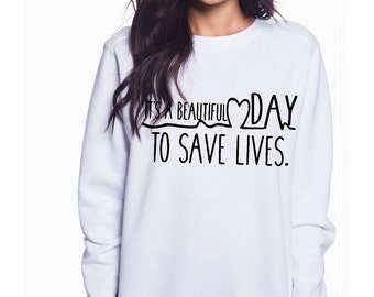 Its a beautiful day to save lives white sweatshirt! Greys anatomy.