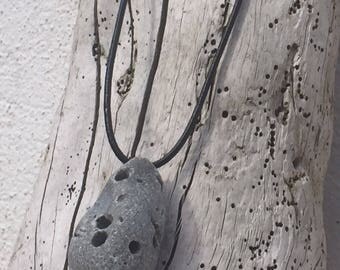 Irish beach pebble Hag Stone pendant necklace.